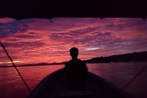 View of the sunset from a speedboat in Raja Ampat